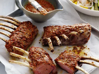 lamb racks with capsicum pesto, asparagus & corn