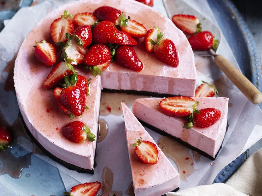 Vegan brownie and strawberry frozen cheesecake