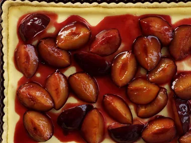 orange and roasted plum tart