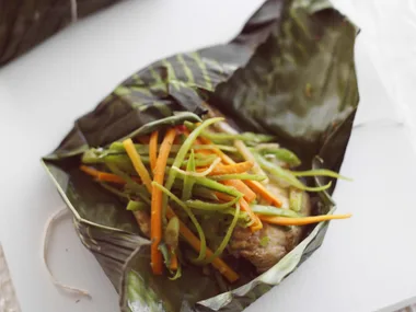 snapper wrapped in banana leaves