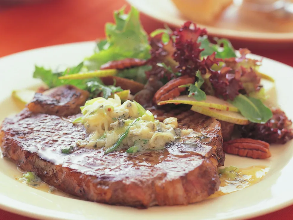 T-BONES WITH BLUE-CHEESE BUTTER AND PEAR SALAD