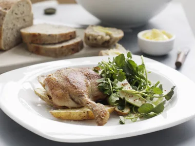 duck confit with pan-fried kipflers and pear and watercress salad
