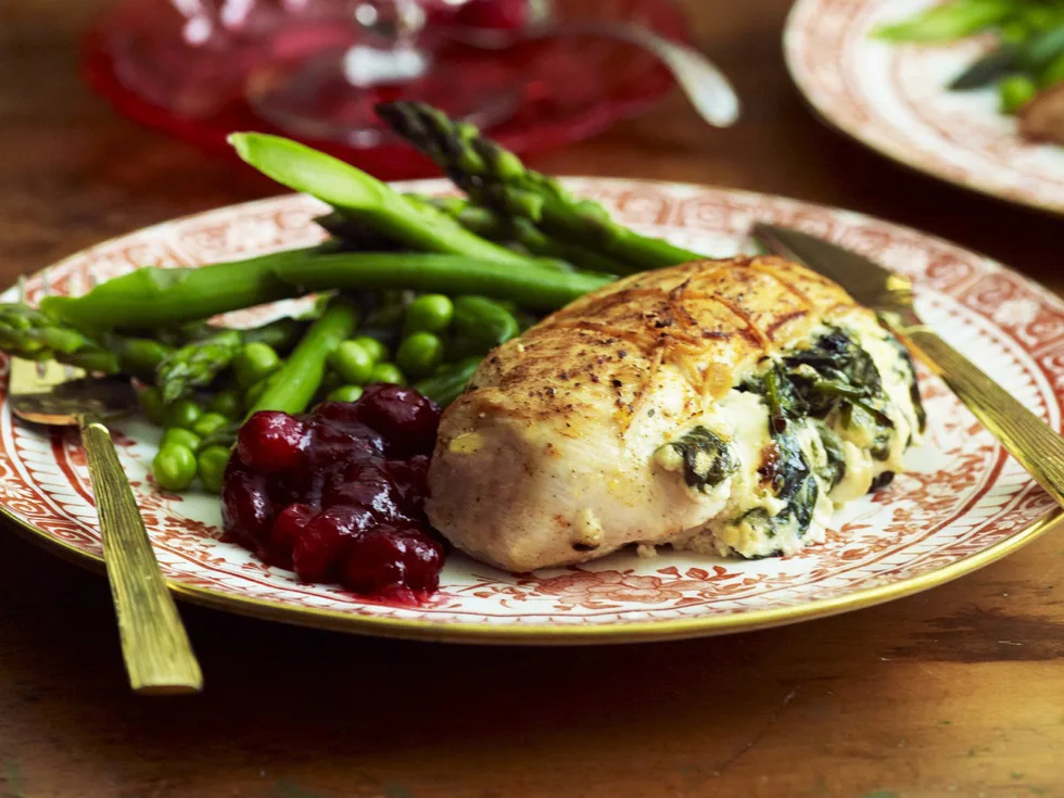 chicken with spinach stuffing and cranberry sauce