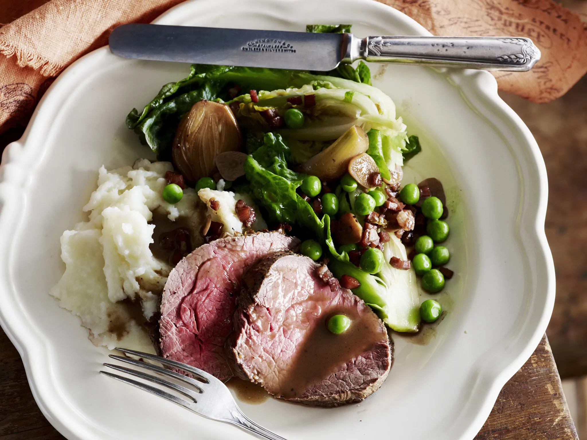 PEPPERED BEEF FILLET WITH FRENCH-STYLE PEAS