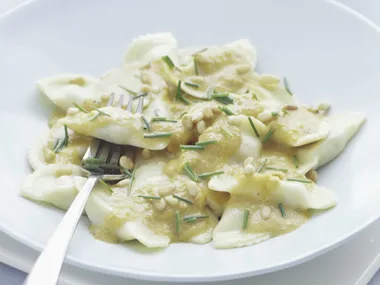 Ricotta and spinach ravioli with pumpkin sauce