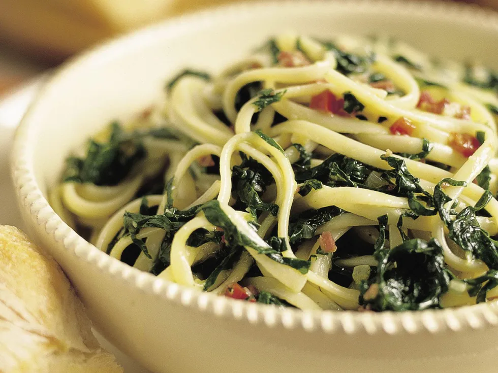 Spaghetti with spinach and coppa