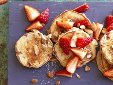 strawberry and ricotta pancakes with honey