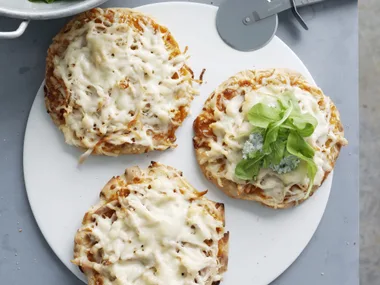 satay pizza with rocket and raita