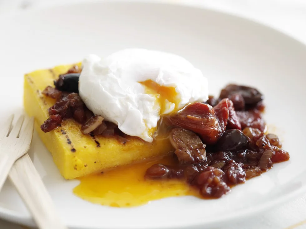 poached egg on grilled polenta with capsicum olive relish