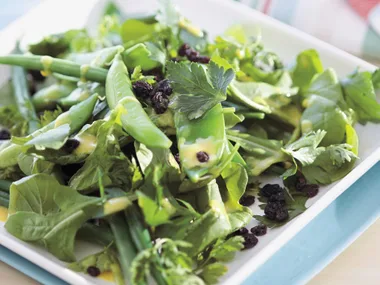 Green vegetable salad with american mustard dressing