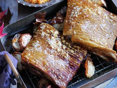 SLOW-ROASTED PORK BELLY WITH PICKLED GRAPES & CRUSHED KUMARA