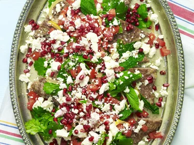 kibbeh with tomato and pomegranate salad