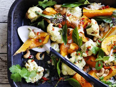coconut-roasted pumpkin and cauliflower with chilli, lime and cashews