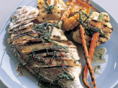 Whole fish and vegetables with chilli basil butter sauce