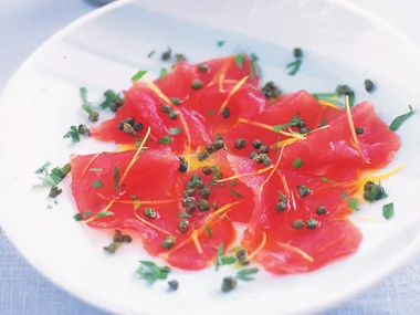 Tuna carpaccio with lemon oil and baby capers
