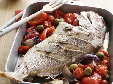 Roasted fish with tomatoes, capsicums and olives