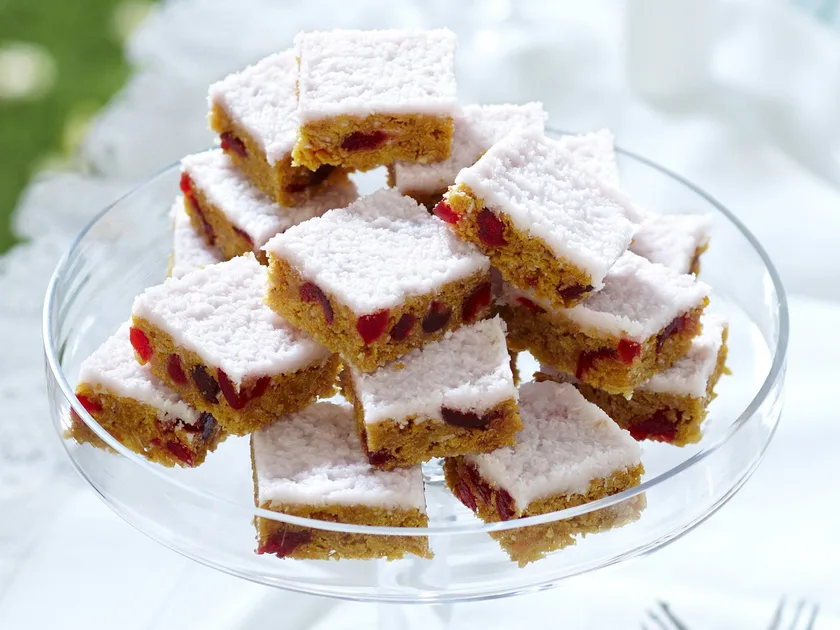 Cherry squares with coconut ice frosting