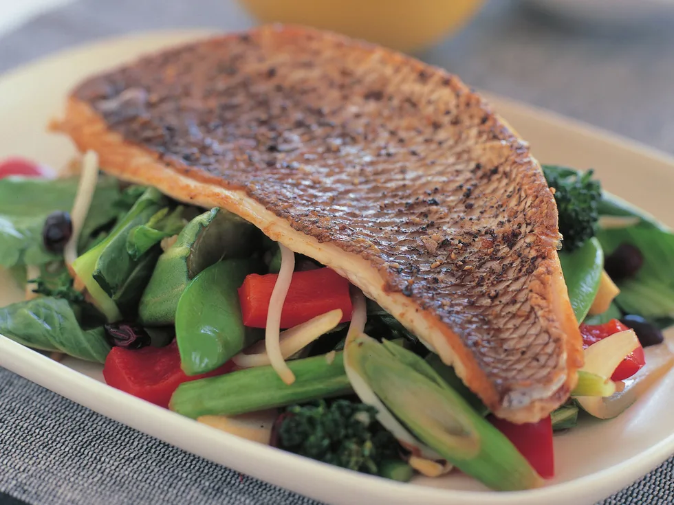crisp-skinned snapper with stir-fried vegetables and black beans