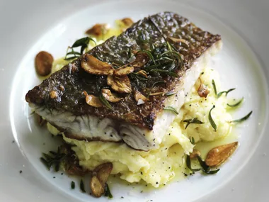 crisp-skinned fish with roast garlic skordalia