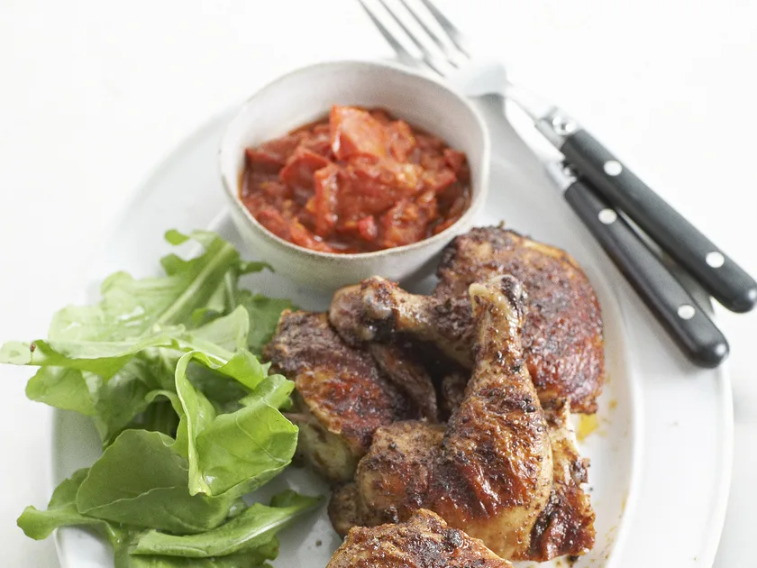 Barbecued cajun chickens with spicy tomato salsa
