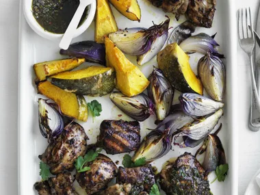 jerk chicken with pumpkin and onion