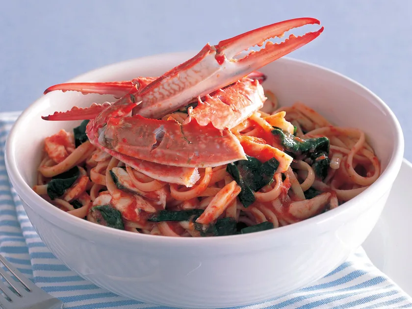 Crab pasta salad with warm tomato, tarragon and basil sauce