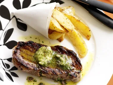 Grilled steaks with anchovy butter