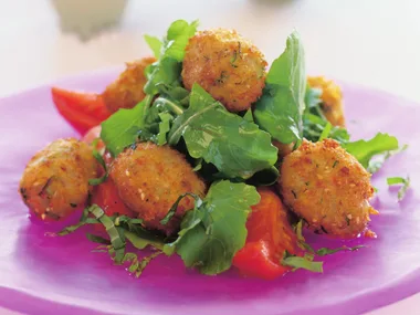 lentil balls with tomatoes and rocket