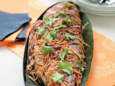 whole snapper wrapped in banana leaf