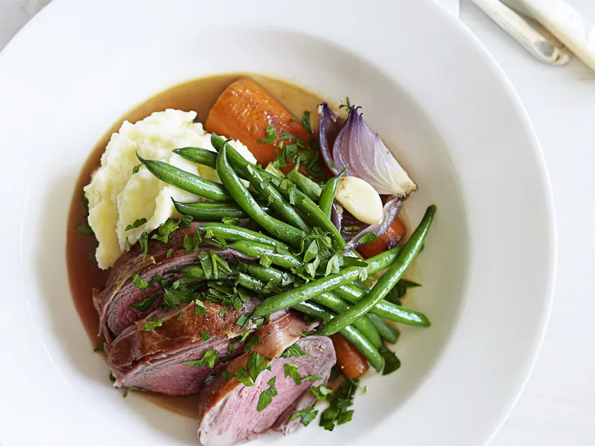 Prosciutto-wrapped lamb pot roast with potato and celeriac mash