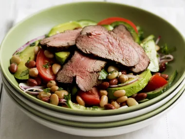 cajun-spiced beef and garlicky bean salad