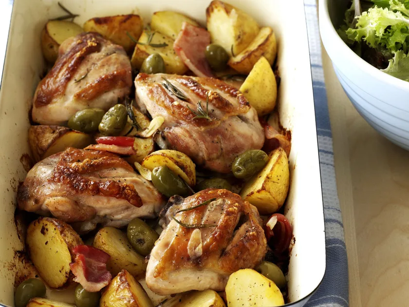 Roast chicken with garlic potatoes and rosemary
