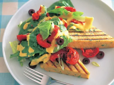 Grilled herb polenta with semi-dried tomato and olive salad