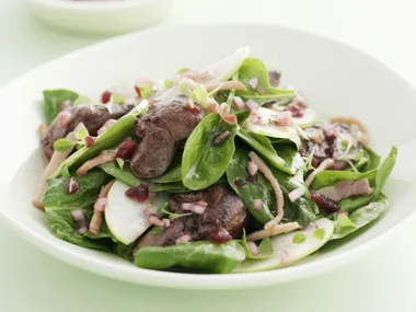 Salad of greens, chicken livers, bacon and apple