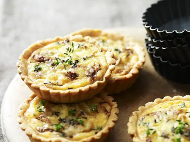 onion and smoked cheddar tarts
