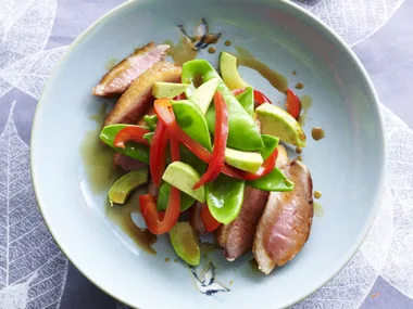 Sake duck with snow peas and avocado