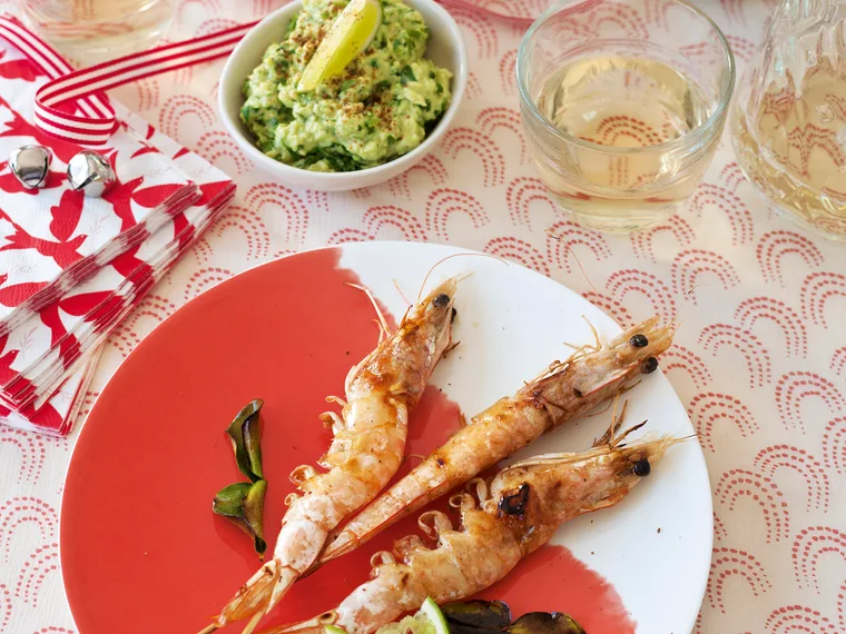 Prawns on skewers with green chilli avocado dip