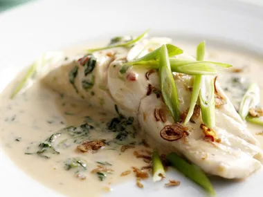 Coconut-poached fish with spinach