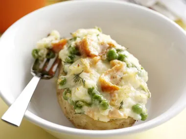 baked potatoes with salmon and peas