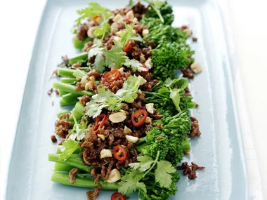 thai-style sticky pork on broccolini