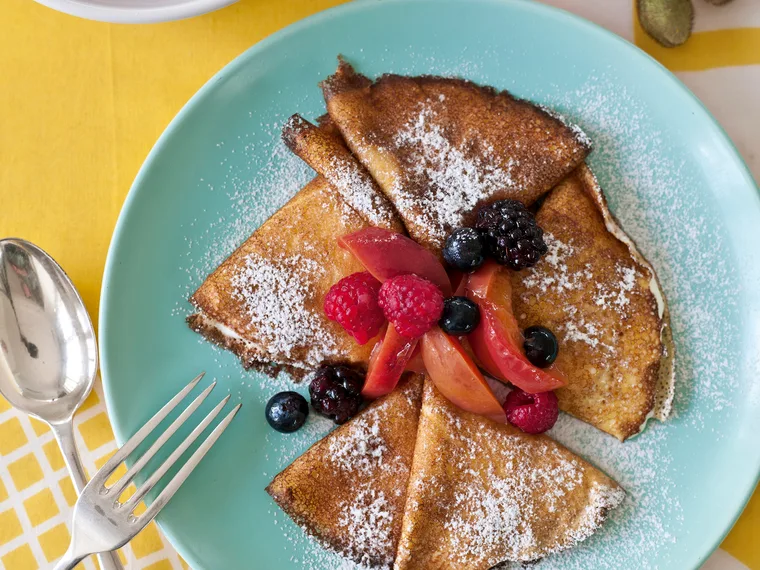 Pancakes with poached stone fruit & berries