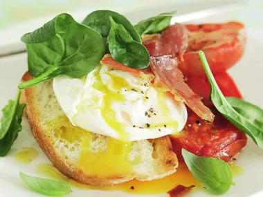 baked roma tomatoes with prosciutto,poached eggs and spinach
