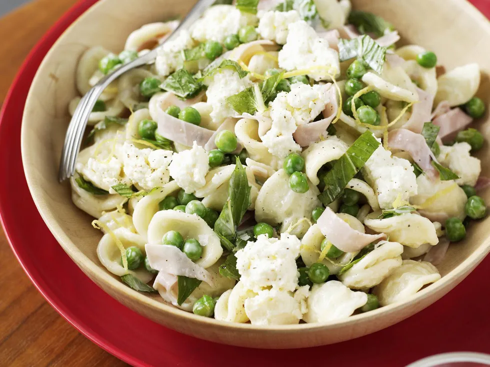 Warm pasta, pea and ricotta salad