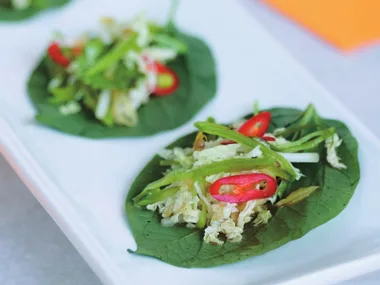 green mango salad on betel leaves
