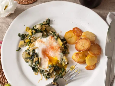 Smoky paprika eggs with leeks and silverbeet