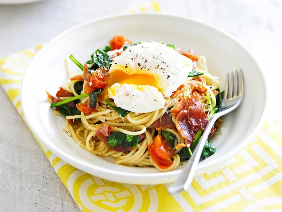 Pasta with poached egg prosciutto spinach