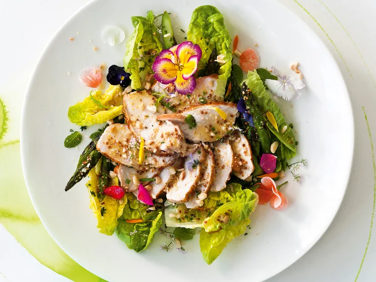 Grilled asparagus and pan-fried chicken breasts with verjuice and hazelnut dressing