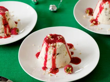 Christmas cake meringue bombes with raspberries
