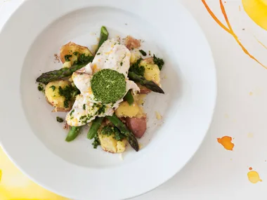 Steamed fish with watercress butter, red potatoes and asparagus