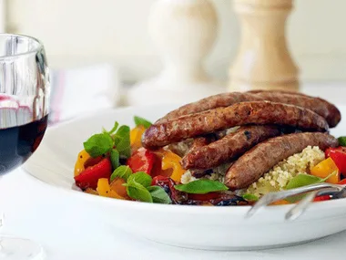 Merguez with peppers and couscous